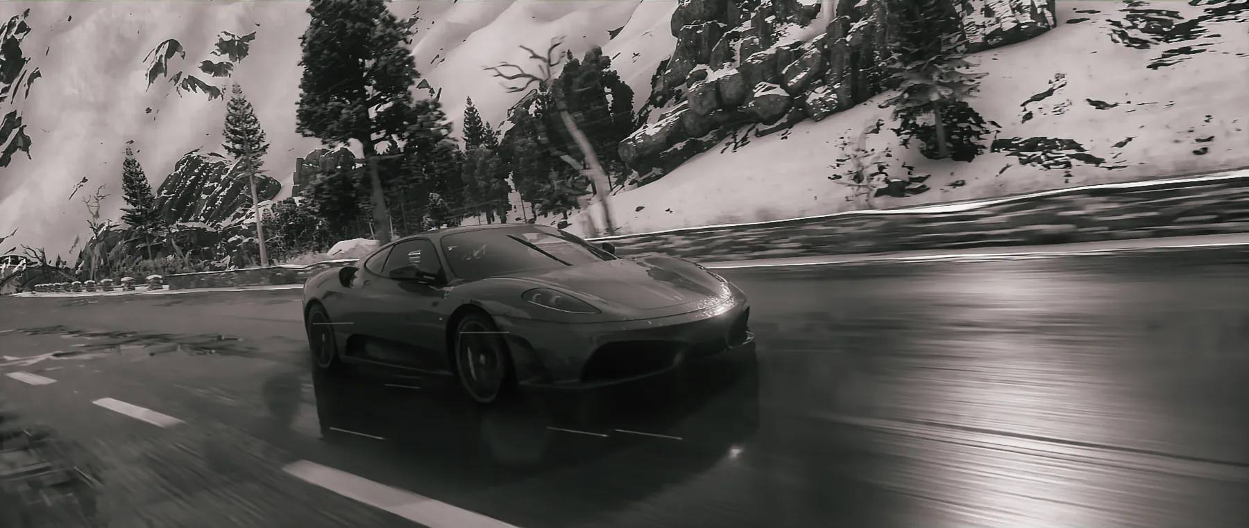 A coupe on a snowy mountain pass